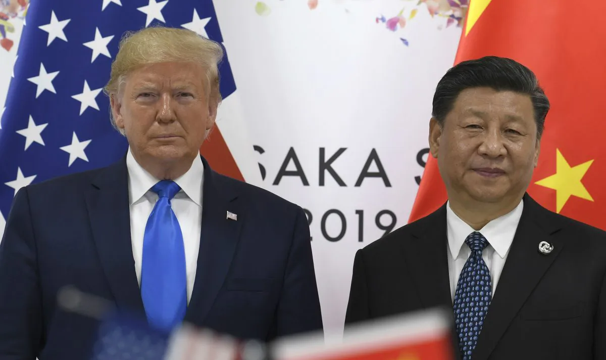 President Donald Trump,  poses for a photo with Chinese leader Xi Jinping during a meeting on the sidelines of the G-20 summit in Osaka, Japan ,on June 29, 2019. (Susan Walsh/AP Photo)