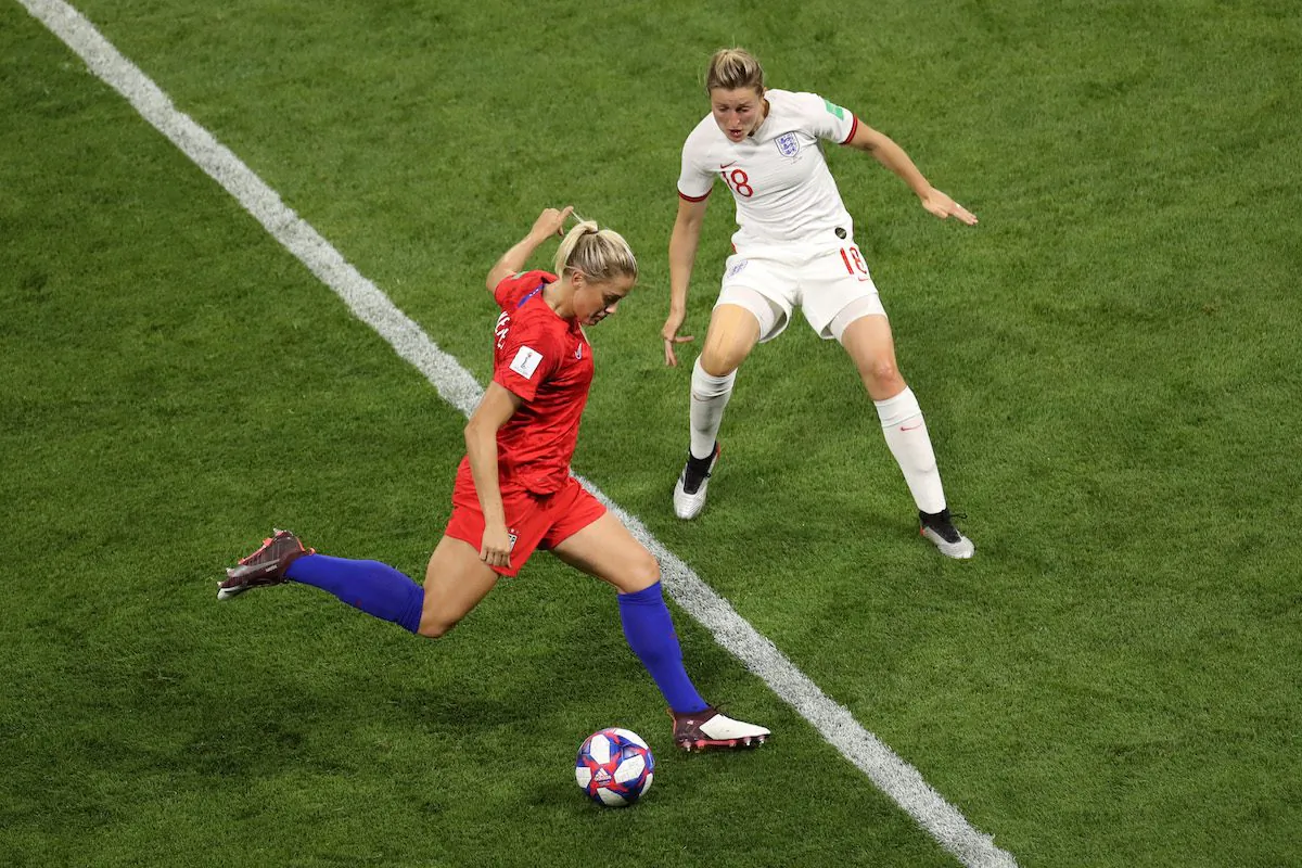 Abby Dahlkemper of the USA is challenged by Ellen White of England during the 2019 FIFA Women's World Cup France Semi Final match between England and USA at Stade de Lyon on July 02, 2019 in Lyon, France. (Maja Hitij/Getty Images)