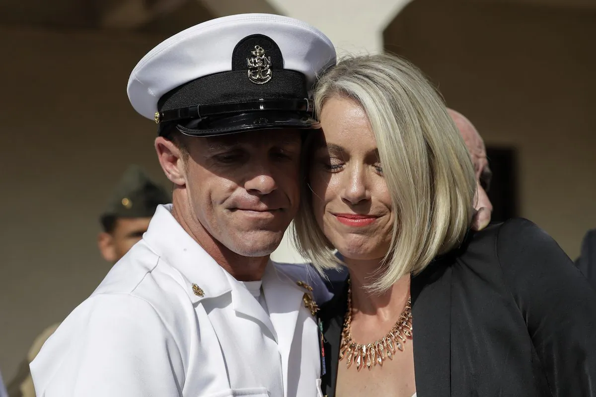 Navy Special Operations Chief Edward Gallagher (L) and his wife, Andrea Gallagher hug after leaving a military court on Naval Base San Diego in San Diego, on July 2, 2019. (Gregory Bull/AP Photo)