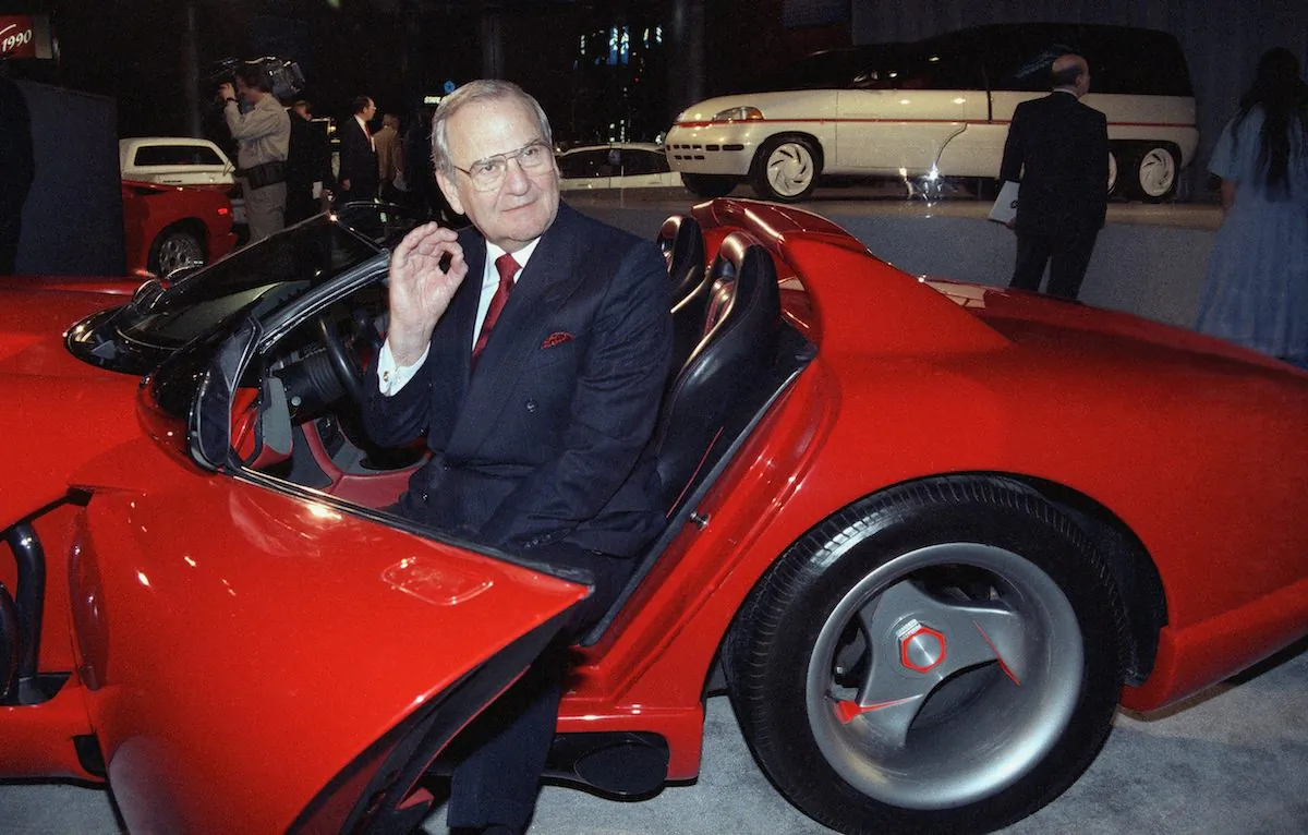 Chrysler Corporation Chairman Lee A. Iacocca sits in a 1990 Dodge Viper sports car as the ?Chrysler in the 90's six city tour makes a visit to New York, on March 28, 1990. (Osamu Honda/AP Photo)