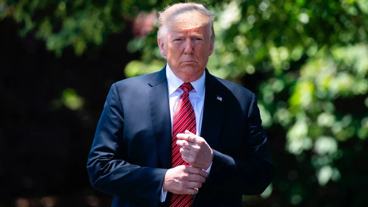 President Donald Trump walks out of the Oval Office to speak with reporters at the White House on June 11, 2019. (Jim Watson/AFP/Getty Images)