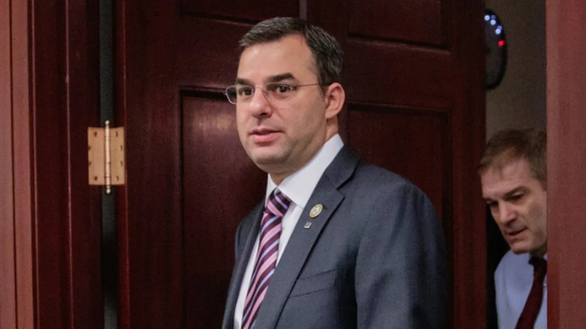 Rep. Justin Amash, R-Mich., followed by Rep. Jim Jordan, R-Ohio, leaving a closed-door strategy session on March 28, 2017. (J. Scott Applewhite/AP Photo)