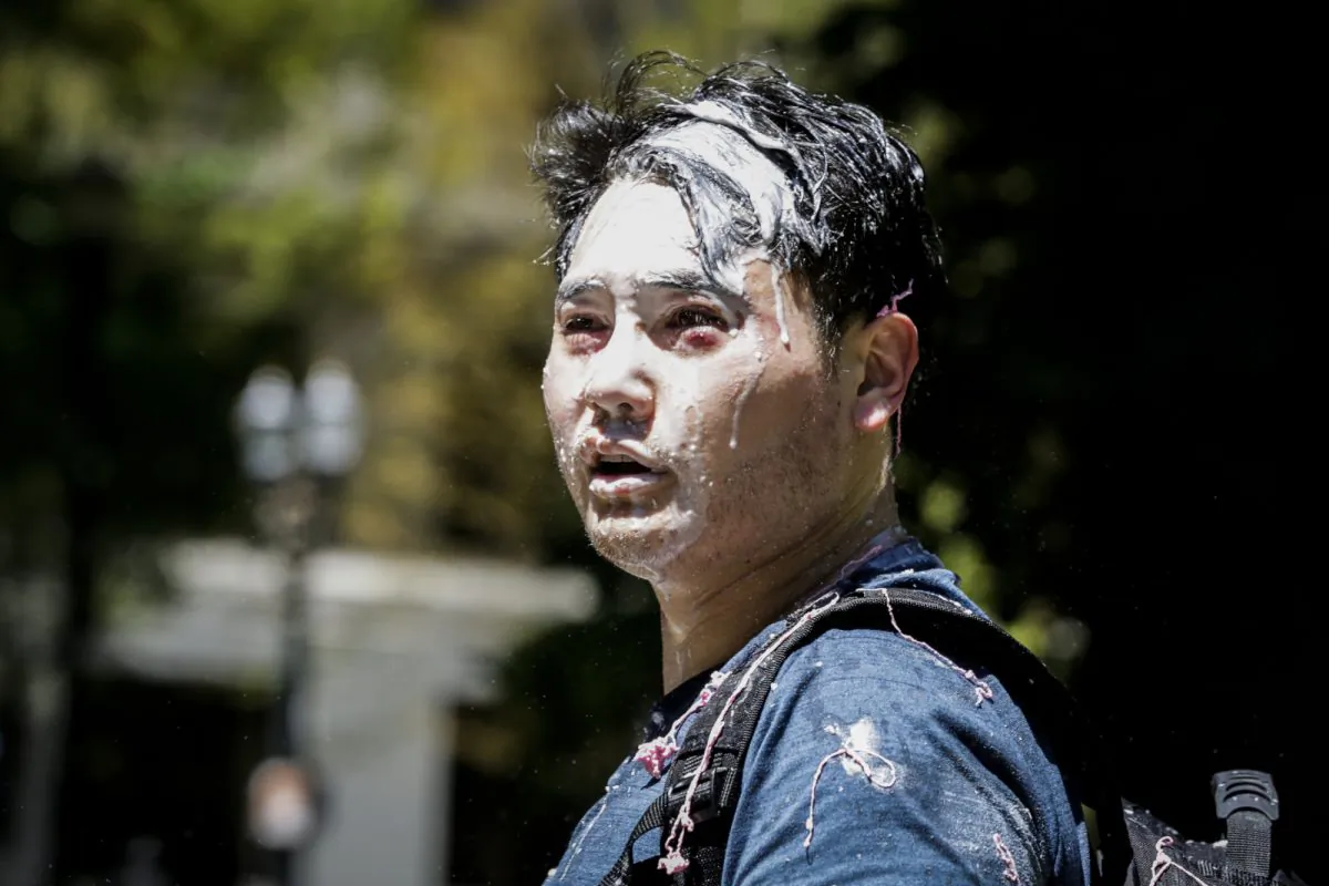 Andy Ngo, a Portland-based journalist, covered in an unknown substance after being attacked by Antifa in Portland, Ore., on June 29, 2019. (Moriah Ratner/Getty Images)