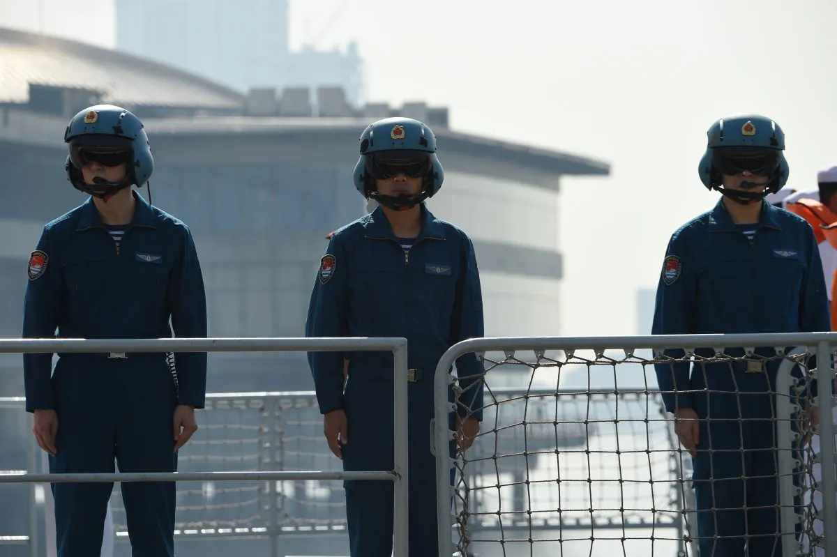 Chinese pilots onboard the guided-missile frigate Wuhu (539) stand in formation shortly after docking at the international port in Manila, Philippines on Jan. 17, 2019. (Ted Aljibe/AFP/Getty Images)