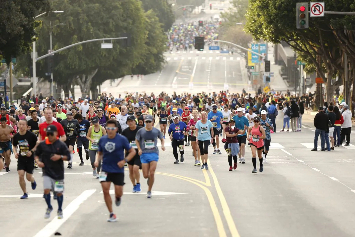 Runners climb 1st Street during the 2019 Skechers Performance Los Angeles Marathonon in Los Angeles, California on March 24, 2019. (Photo by Katharine Lotze/Getty Images)