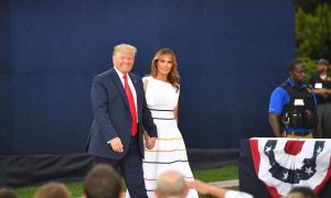 Melania Trump Stuns in Off-the-Shoulder White Striped Dress at 'Salute to America' Celebration