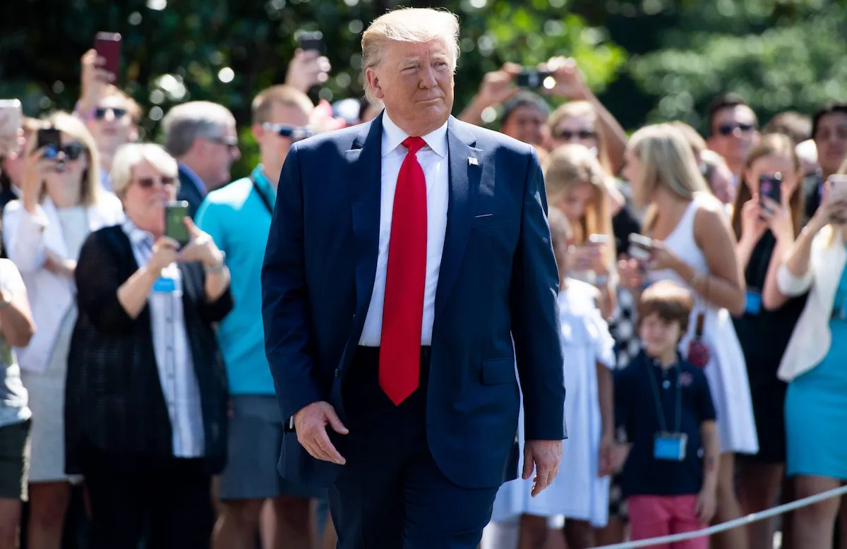 US President Donald Trump walks to speak to the media prior to departing on Marine One from the South Lawn of the White House in Washington, DC, July 5, 2019. (Saul Loeb/AFP/Getty Images)