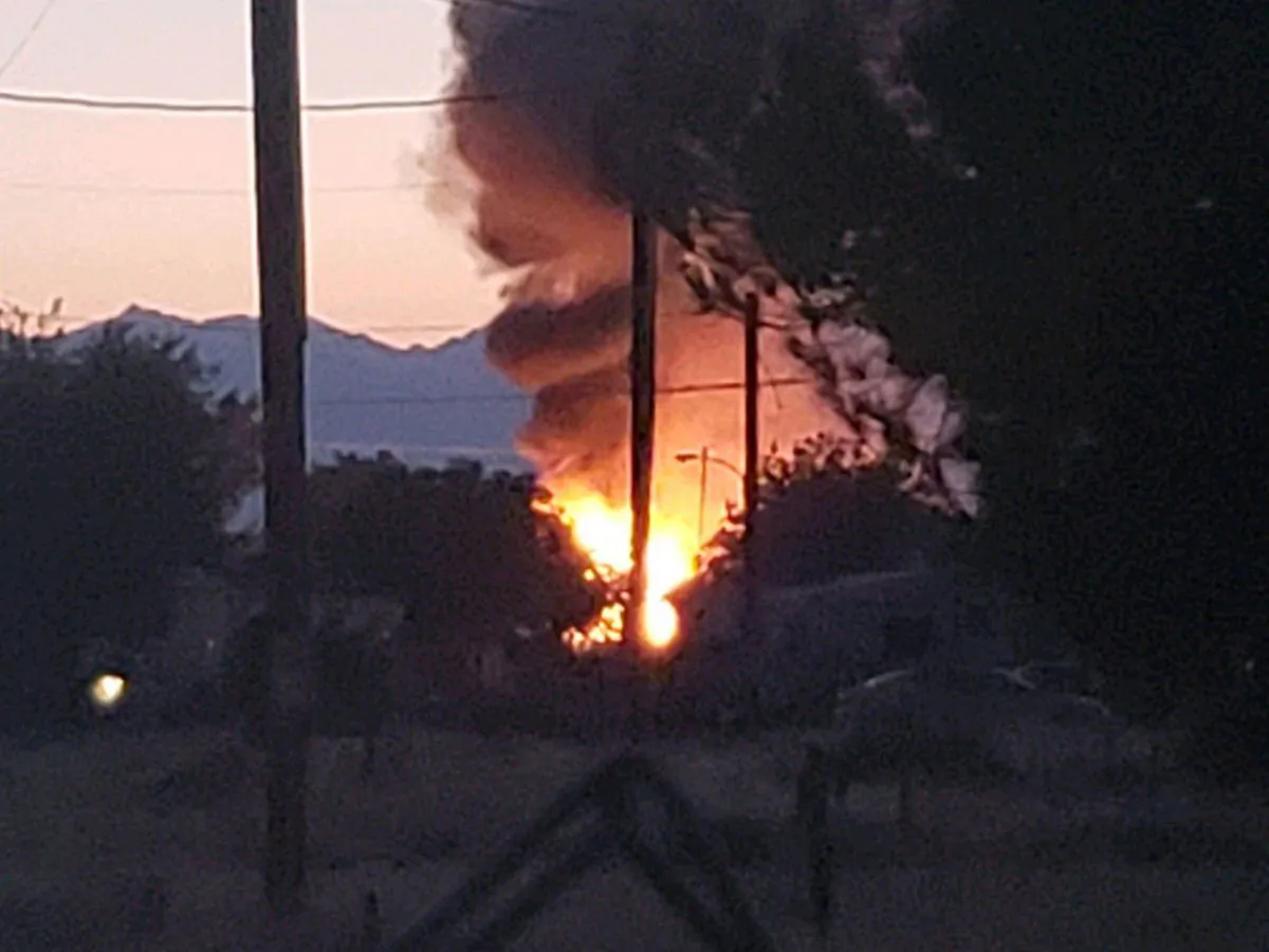 Smoke billows from a fire that broke out behind the Casa Corona restaurant following an earthquake in Ridgecrest, Calif., on July 5, 2019. (Jessica Weston/The Daily Independent via AP)