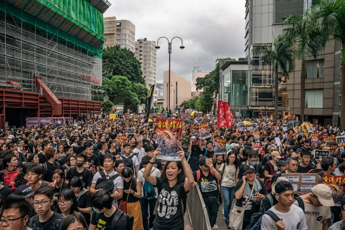 Protesters hold placards and shout slogans as they take part in a rally on a street on July 7, 2019 in Hong Kong, China. Over 230,000 people rallied at Kowloon on Sunday as pro-democracy demonstrators have continued on the streets of Hong Kong for the past month, calling for the complete withdrawal of a controversial extradition bill. (Anthony Kwan/Getty Images)
