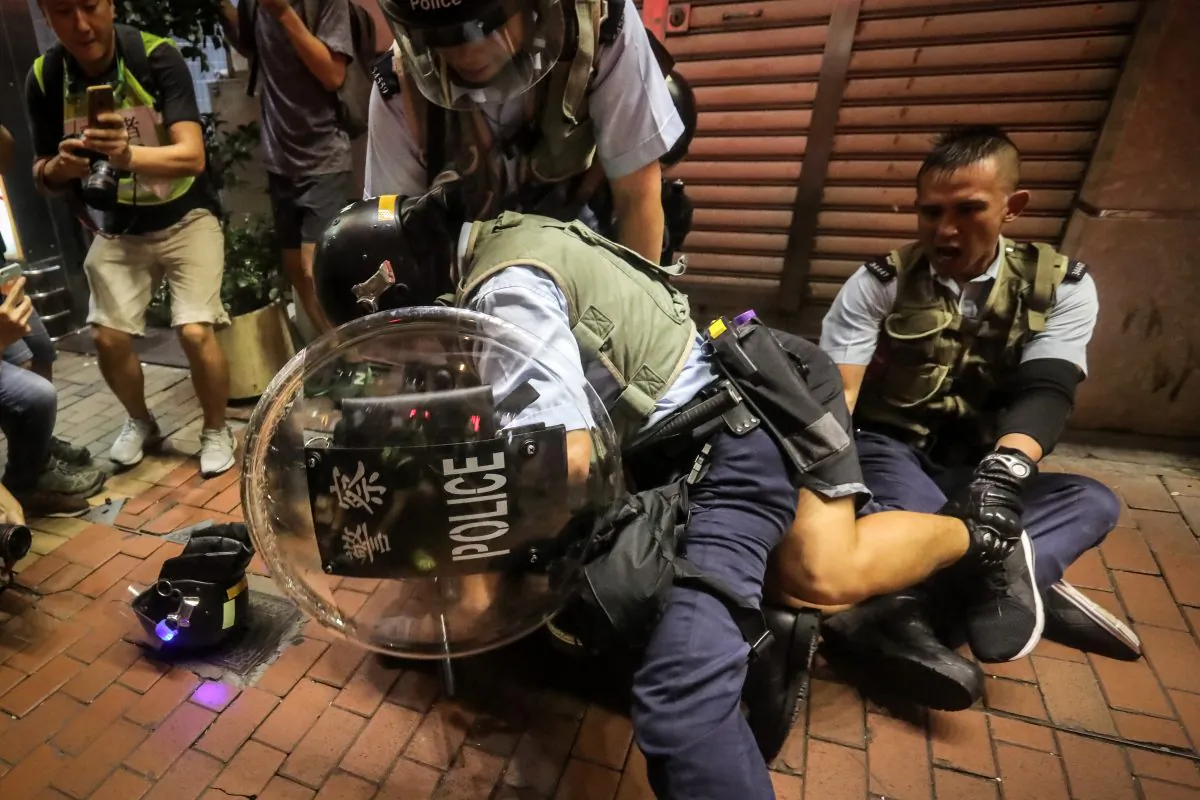 A protester reacts as he is detained during clashes with the police in Mong Kok district after a demonstration at West Kowloon railway station protesting against the proposed extradition bill on July 7, 2019, in Hong Kong. (VIVEK PRAKASH/AFP/Getty Images)
