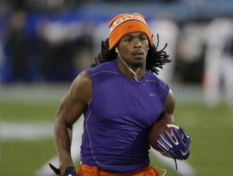 File photo showing Tyshon Dye warming up prior to the Atlantic Coast Conference championship NCAA college football game against North Carolina in Charlotte, N.C. Dye, a former Clemson and East Carolina running back, drowned after swimming in a lake during a family outing on July 5, 2019. (Bob Leverone/AP)