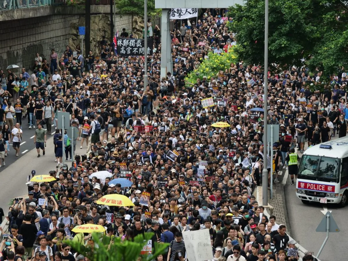 Protesters march Kowloon Park Drive during a protest in Hong Kong on July 7, 2019. (Pang Dawei/The Epoch Times)