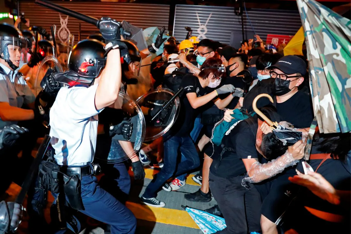 Riot police disperse anti-extradition bill protesters after a march at Hong Kong’s tourism district Nathan Road near Mongkok, China on July 7, 2019. (Tyrone Siu/Reuters)