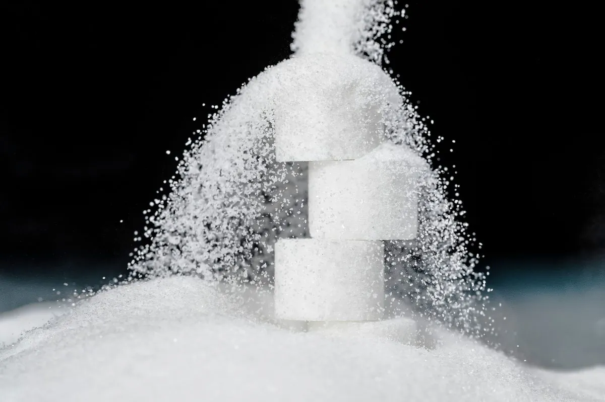 Grains of sugar falling on sugar cubes (Joel Saget/AFP/Getty Images)