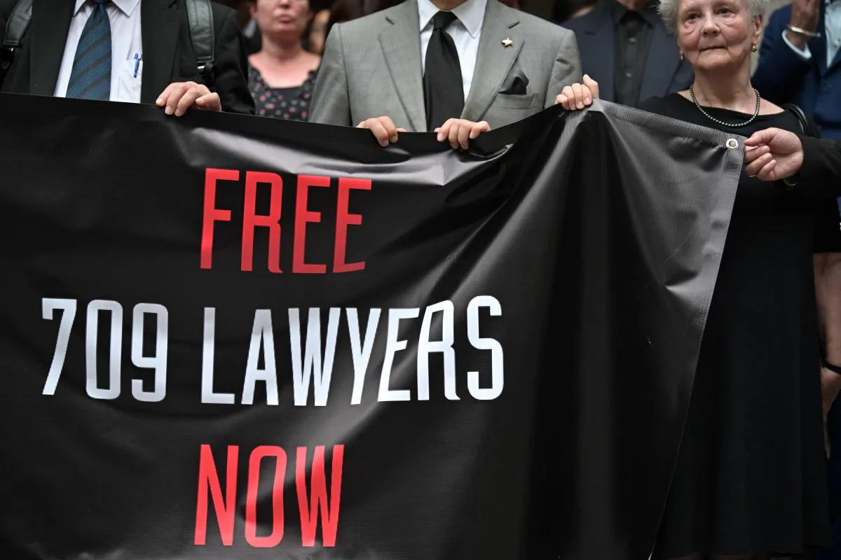 Lawyers and activists gather for a silent protest at the court of final appeal in Hong Kong for the fourth anniversary of the "709" crackdown on human rights lawyers across China, on July 9, 2019. (Anthony Wallace/AFP/Getty Images)
