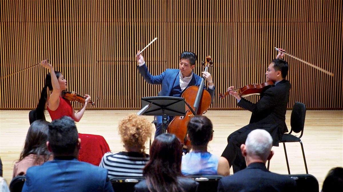 Three of the New Asia Chamber Music Society’s directors–(from left to right) violinist Tien-Hsin “Cindy” Wu, cellist Nan-Cheng Chen, and violist Andy Lin–perform on the same stage. (New Asia Chamber Music Society)
