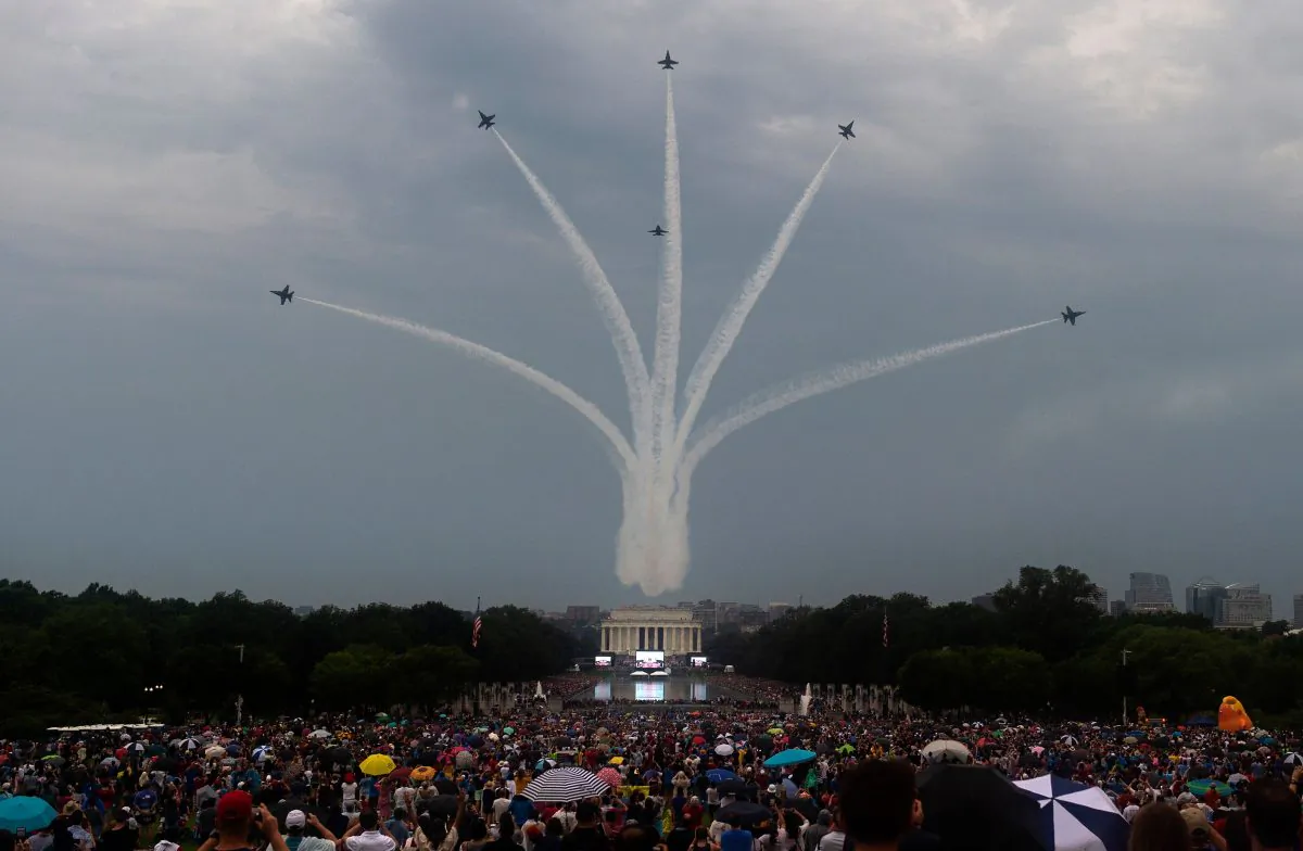 The Blue Angels (six F-18s) fly overhead as people gather on the National Mall for the "Salute to America" Fourth of July event with US President Donald Trump at the Lincoln Memorial in Washington, DC, July 4, 2019.  ANDREW CABALLERO-REYNOLDS/AFP/Getty Images