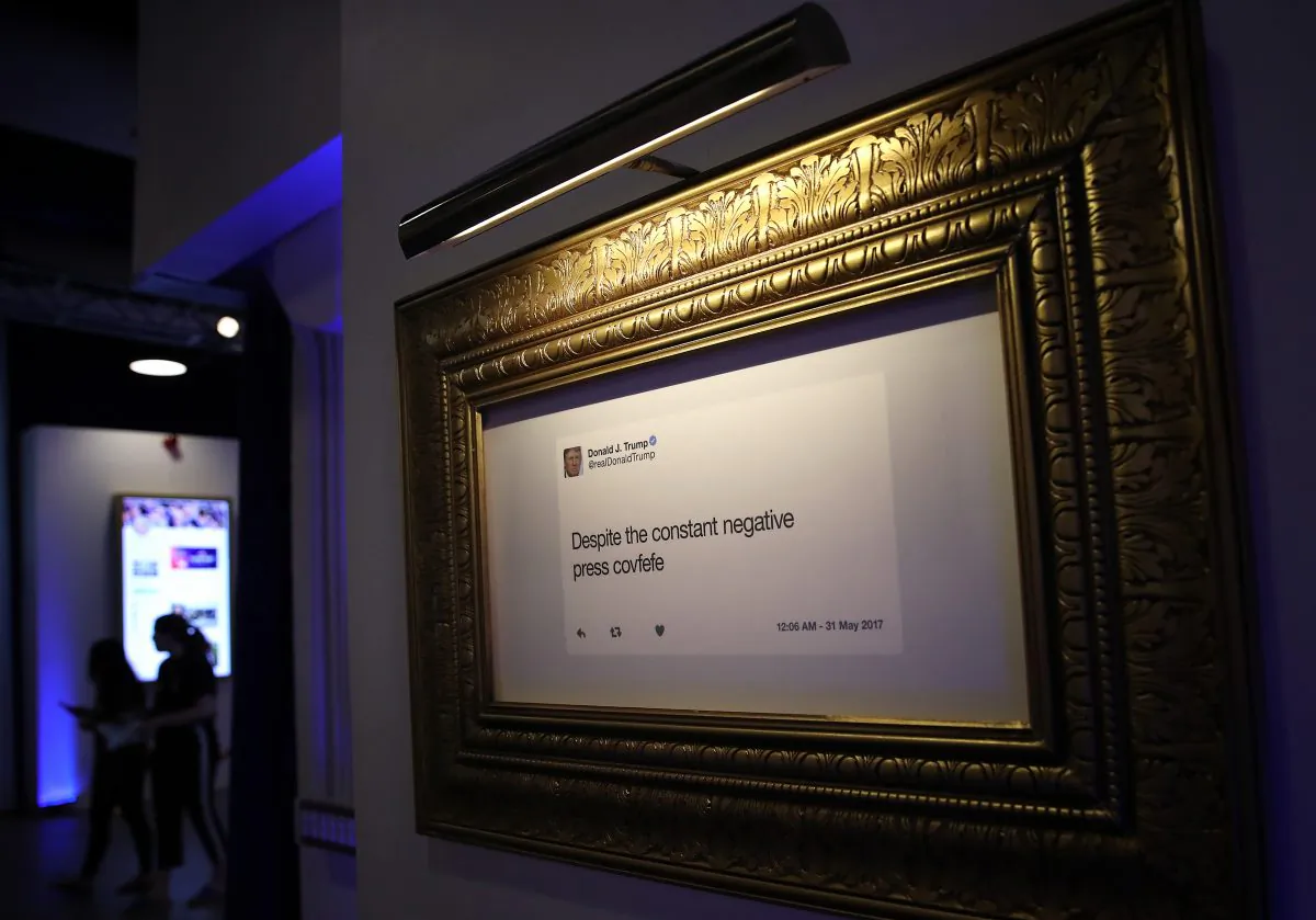 Patrons view exhibits at the opening of “The Donald J. Trump Presidential Twitter Library” in Washington on June 14, 2019. (Win McNamee/Getty Images)