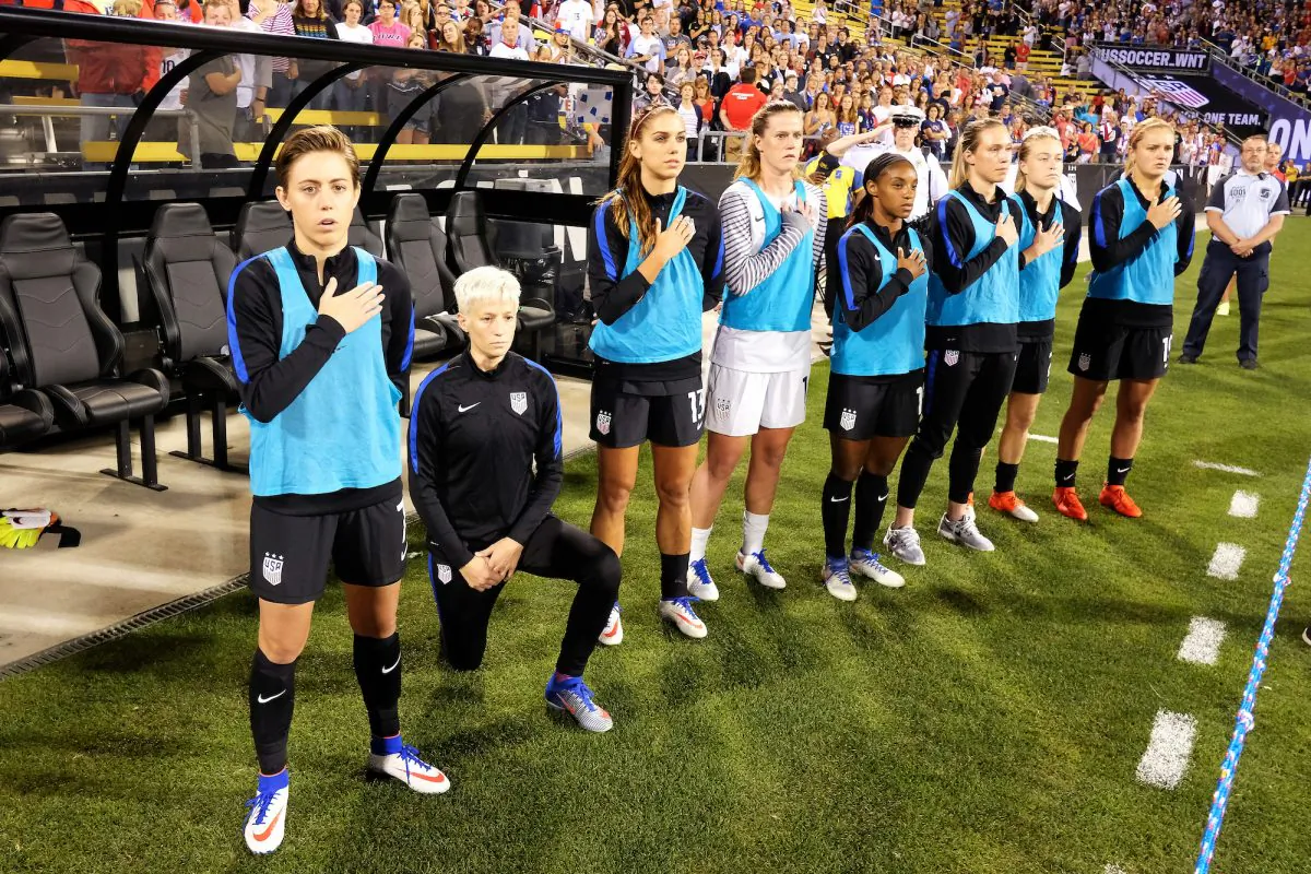 Megan Rapinoe #15 of the U.S. Women's National Team kneels during the playing of the U.S. National Anthem before a match against Thailand at MAPFRE Stadium in Columbus, Ohio on September 15, 2016. (Jamie Sabau/Getty Images)