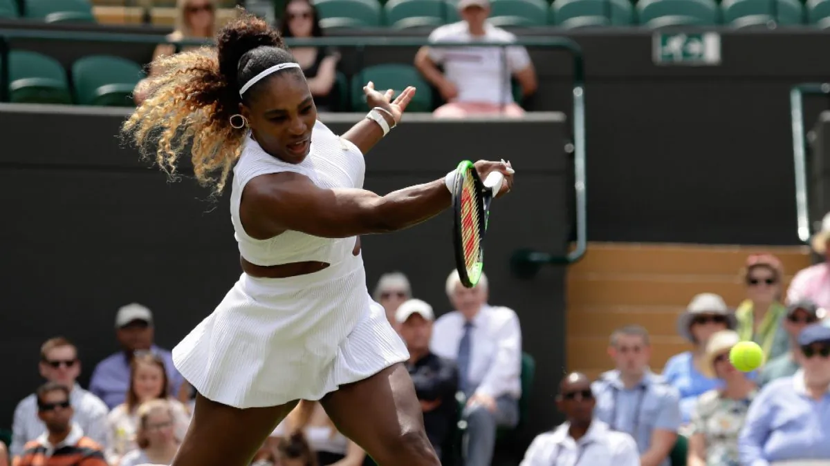 United States' Serena Williams returns the ball to Spain's Carla Suarez Navarro in a women's singles match during day seven of the Wimbledon Tennis Championships in London on July 8, 2019. (Kirsty Wigglesworth/Photo/AP)
