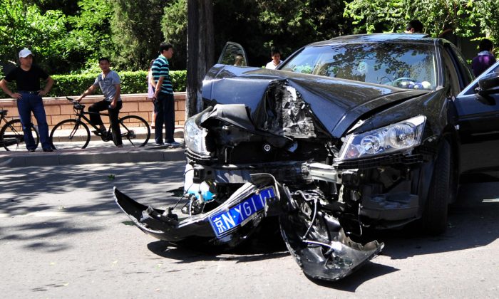 File photo of a car crash in China. (Frederic J. Brown/AFP/Getty Images)