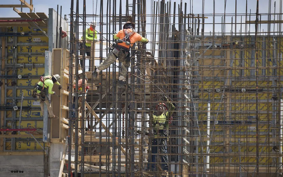 Construction workers in Miami on May 17, 2019. (Joe Raedle/Getty Images)
