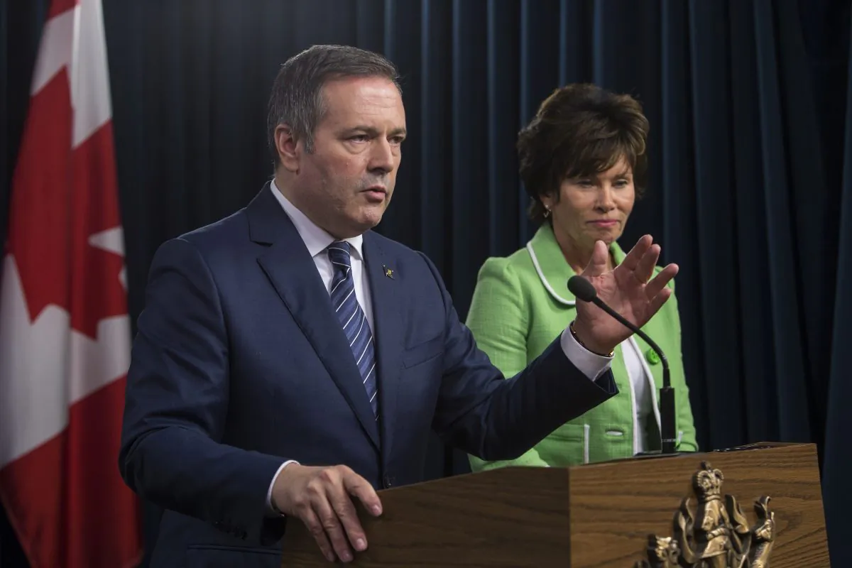 Alberta Premier Jason Kenney and Energy Minister Sonya Savage respond to the federal approval of the Trans Mountain Pipeline in Edmonton, Alberta, on June 18, 2019. (Amber Bracken/The Canadian Press)