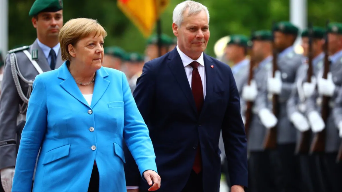 German Chancellor Angela Merkel receives Finland's new Social Democrat Prime Minister Antti Rinne with military honours at the Chancellery in Berlin, Germany on July 10, 2019. (Hannibal Hanschke/Reuters)