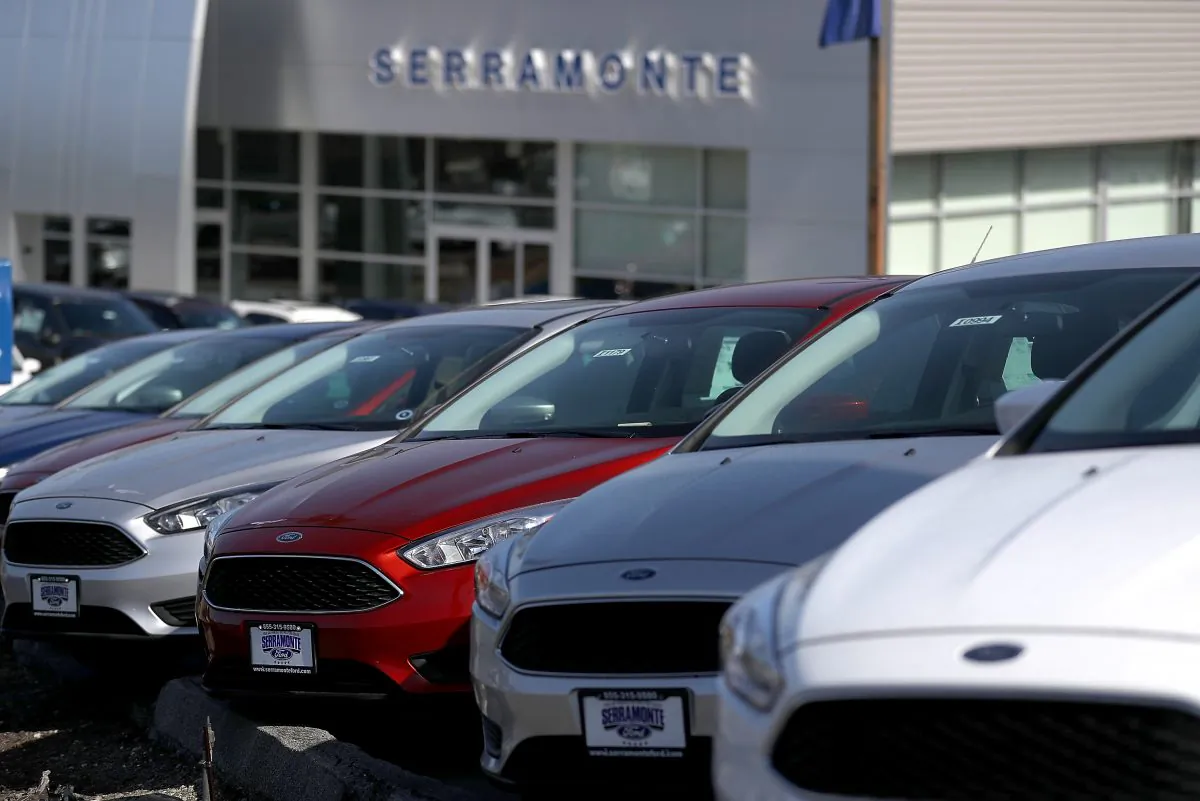 Brand new Ford Focus cars are displayed on the sales lot at Serramonte Ford in Colma, Calif., on Oct. 25, 2018. (Justin Sullivan/Getty Images)