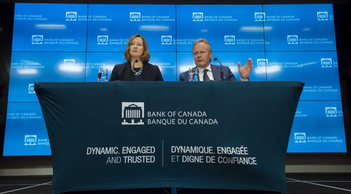 Bank of Canada senior deputy governor Carolyn A. Wilkins (L) and governor Stephen Poloz at a press conference at the bank’s head office in Ottawa on July 10, 2019. (The Canadian Press/Adrian Wyld)