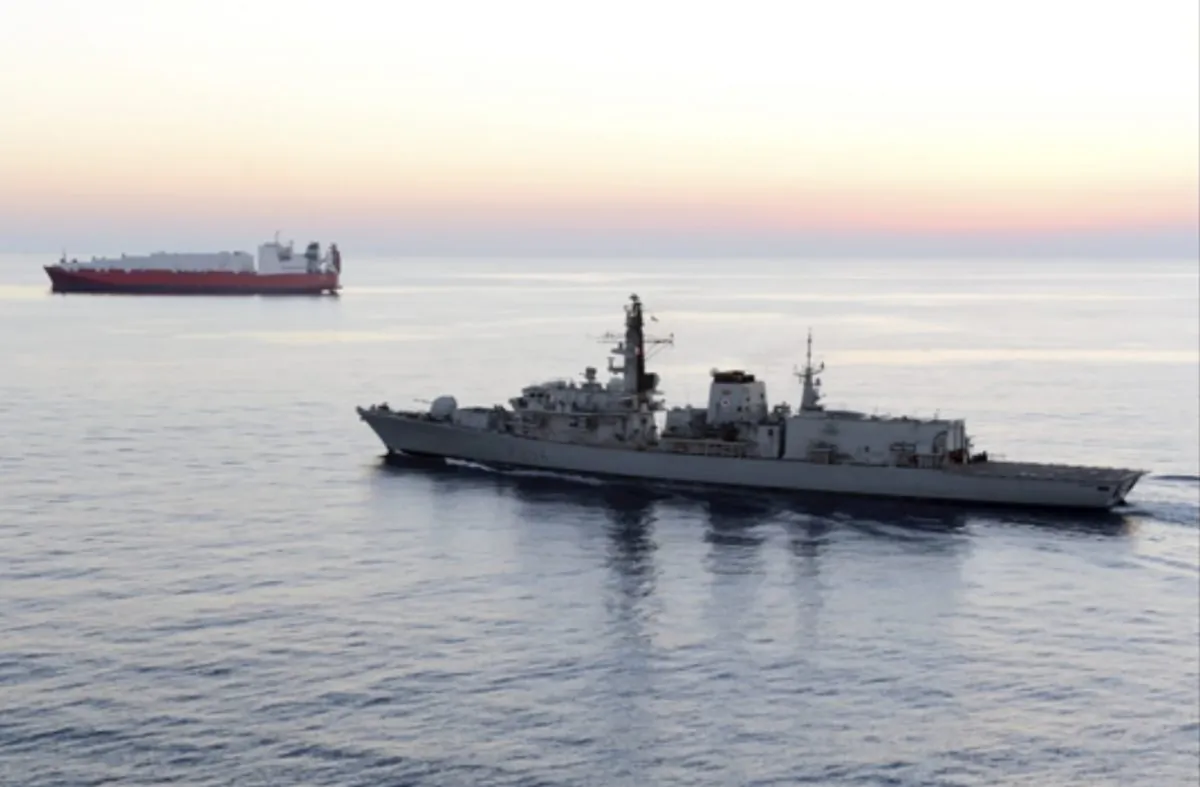 In this image from file video provided by UK Ministry of Defence, British navy vessel HMS Montrose escorts another ship during a mission to remove chemical weapons from Syria at sea off coast of Cyprus in February 2014. (UK Ministry of Defence via AP)