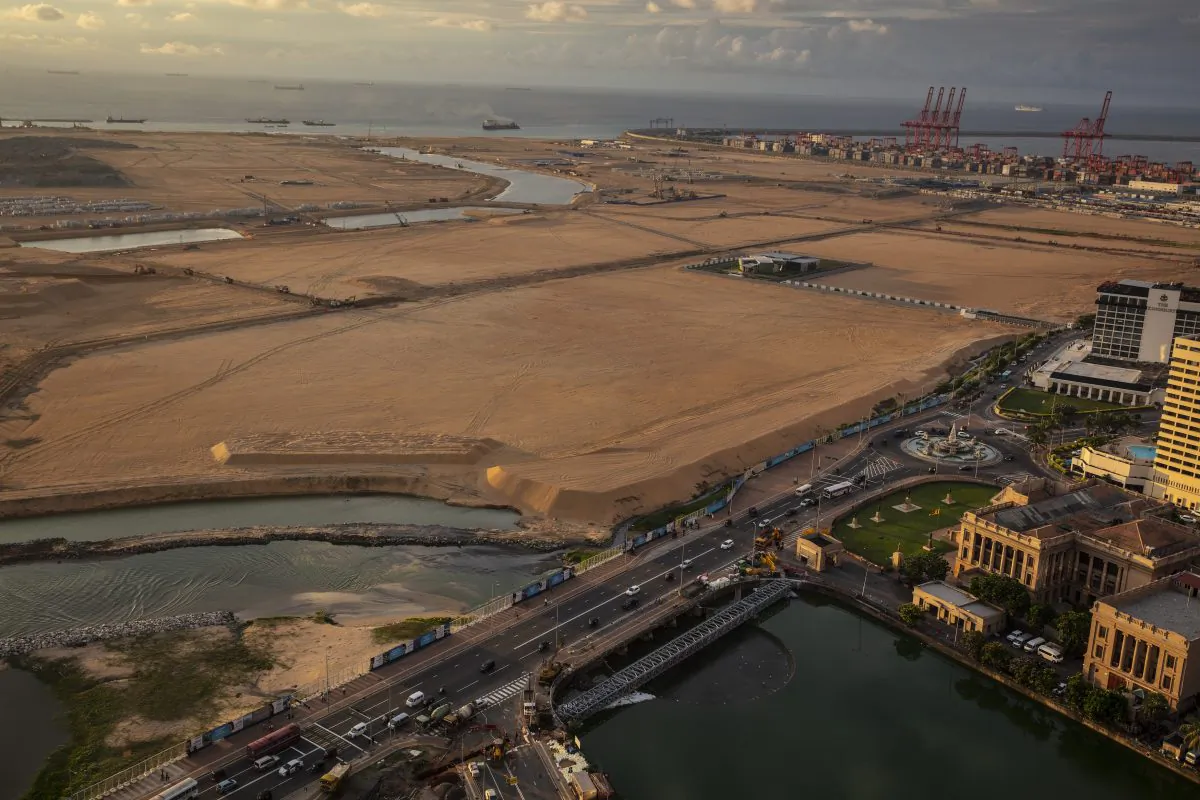 Built on land reclaimed from the Indian Ocean and funded with $1.4 billion in Chinese investment, the Colombo Port City project is seen jutting out into the ocean that will eventually be 65 million cubic meters of sand in Colombo, Sri Lanka on Nov. 20, 2018. (Paula Bronstein/Getty Images)