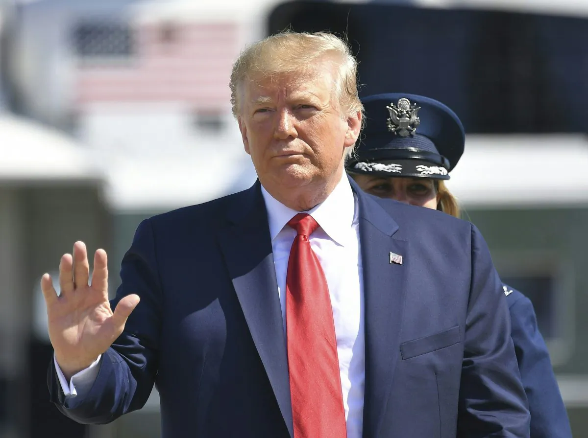 President Donald Trump makes his way to board Air Force One before departing from Andrews Air Force Base in Maryland on July 12, 2019. (Mandel Ngan/AFP/Getty Images)
