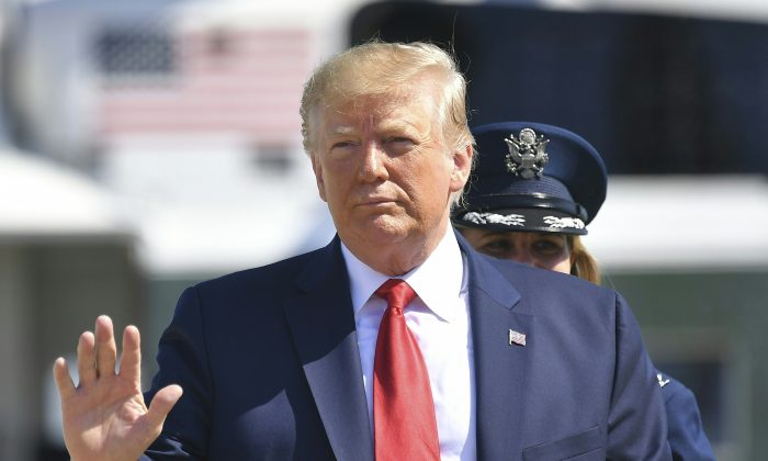 President Donald Trump makes his way to board Air Force One before departing from Andrews Air Force Base in Maryland on July 12, 2019. (Mandel Ngan/AFP/Getty Images)