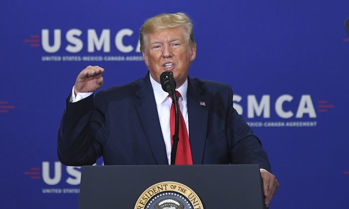 President Donald Trump speaks on the United States-Mexico-Canada Agreement (USMCA) trade agreement at Derco Aerospace Inc. plant in Milwaukee, Wis., on July 12, 2019. (Mandel Ngan/AFP/Getty Images)