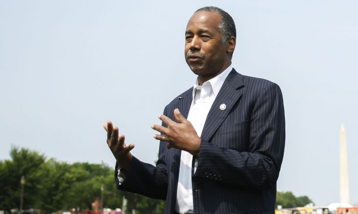 Secretary of Housing and Urban Development Ben Carson answers questions from the press after delivering remarks at the Innovative Housing Showcase on the National Mall in Washington on June 1, 2019. (Samira Bouaou/The Epoch Times)