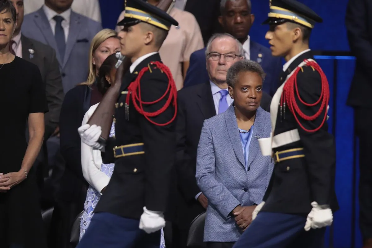 Lori Lightfoot watches the presentation of colors at her inauguration ceremony at the Wintrust Arena in Chicago, Ill., on May 20, 2019. (Scott Olson/Getty Images)