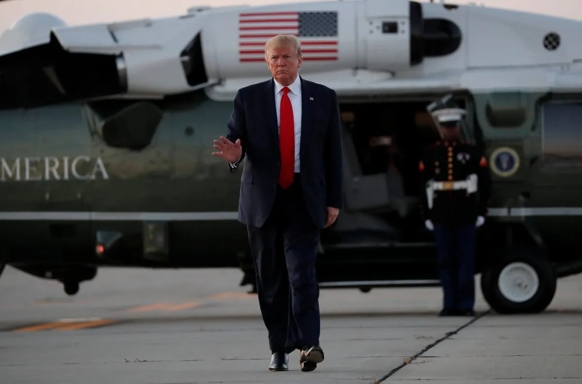 President Donald Trump after arriving from a fund-raising event before departing for Washington D.C., at Cleveland Hopkins International Airport in Cleveland, Ohio, on July 12, 2019. (Reuters/Carlos Barria)