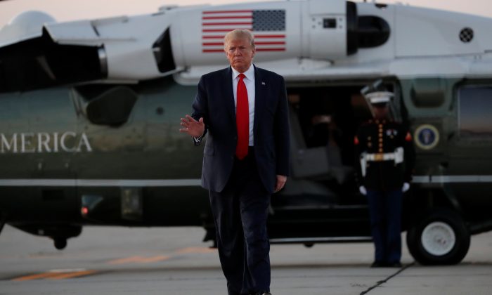 President Donald Trump after arriving from a fund-raising event before departing for Washington D.C., at Cleveland Hopkins International Airport in Cleveland, Ohio, on July 12, 2019. (Reuters/Carlos Barria)