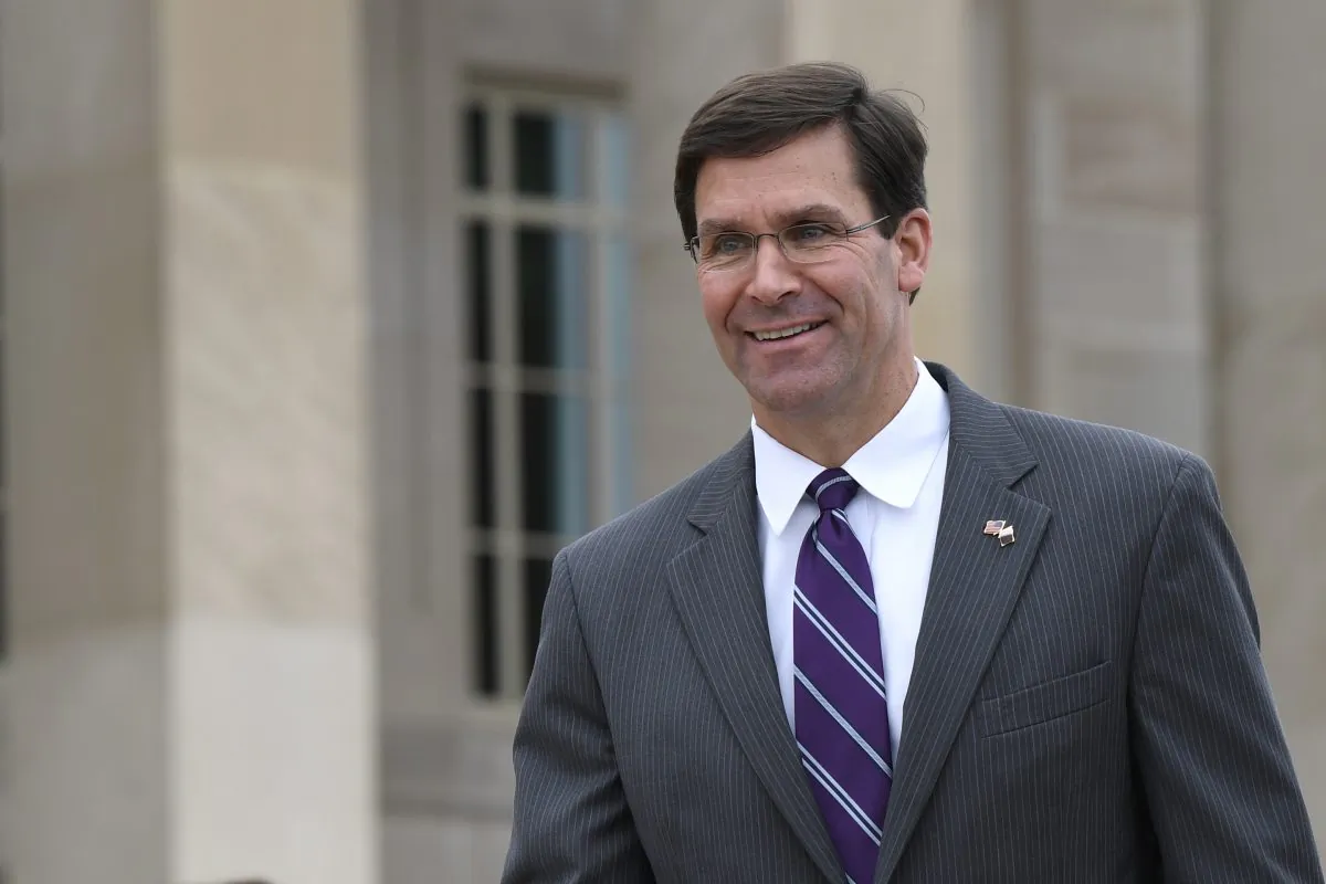 In this July 8, 2019, photo, acting Secretary of Defense Mark Esper waits for the arrival of Qatar's Emir Sheikh Tamim bin Hamad Al Thani to the Pentagon. (Susan Walsh/AP)