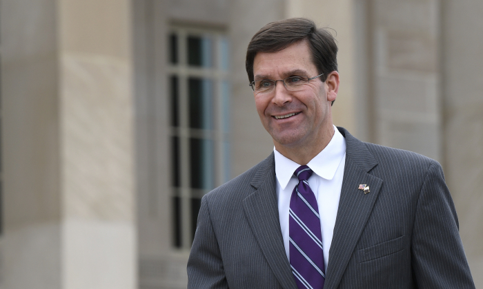 In this July 8, 2019, photo, acting Secretary of Defense Mark Esper waits for the arrival of Qatar's Emir Sheikh Tamim bin Hamad Al Thani to the Pentagon. (Susan Walsh/AP)