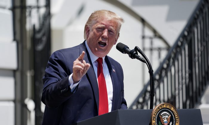 President Donald Trump takes questions from reporters during his 'Made In America' product showcase at the White House July 15, 2019 in Washington, DC. Trump talked with American business owners during the 3rd annual showcase, one day after Tweeting that four Democratic congresswomen of color should ‚Äúgo back‚Äù to their own countries. (Chip Somodevilla/Getty Images)