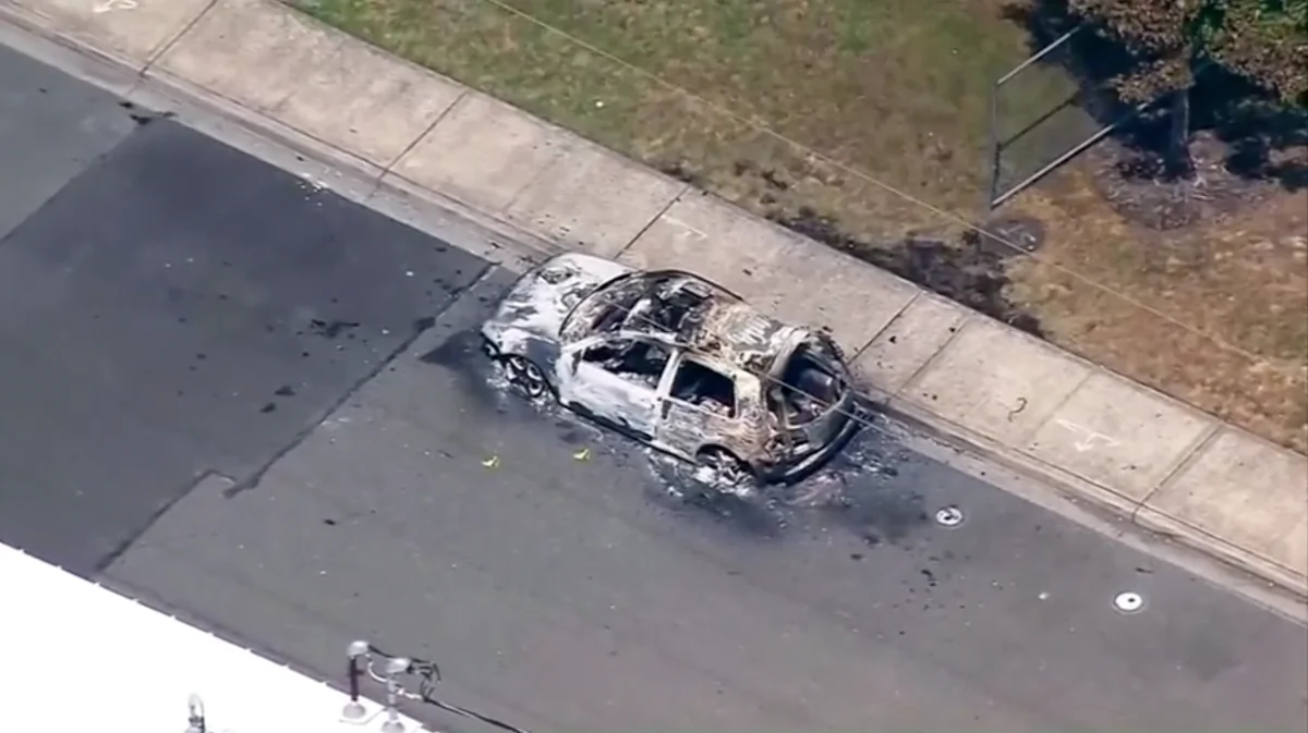 Aerial footage shows a car destroyed by Antifa extremist Willem Van Spronsen on July 13. (Screenshot/Reuters)