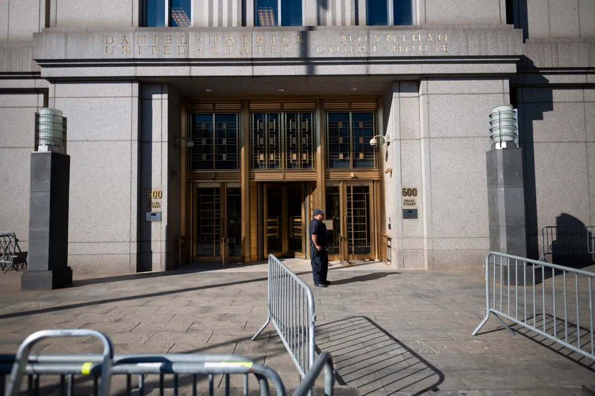 A policeman stands at the courthouse ahead of a bail hearing in U.S. financier Jeffrey Epstein's sex trafficking case in New York City on July 15, 2019. (JOHANNES EISELE/AFP/Getty Images)