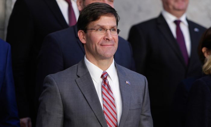Mark Esper poses for a family picture during the NATO Defence Ministers meeting in Brussels on June 27, 2019. (Aris Oikonomou/AFP/Getty Images)