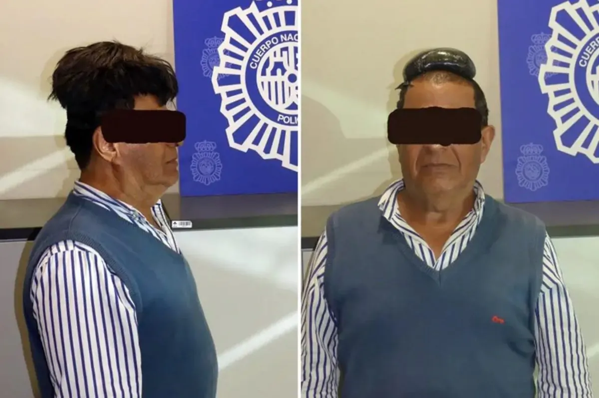 Police in Spain have published a photograph of a man arrested at an airport in Barcelona on suspicion of smuggling cocaine under a wig. (Spanish National Police)