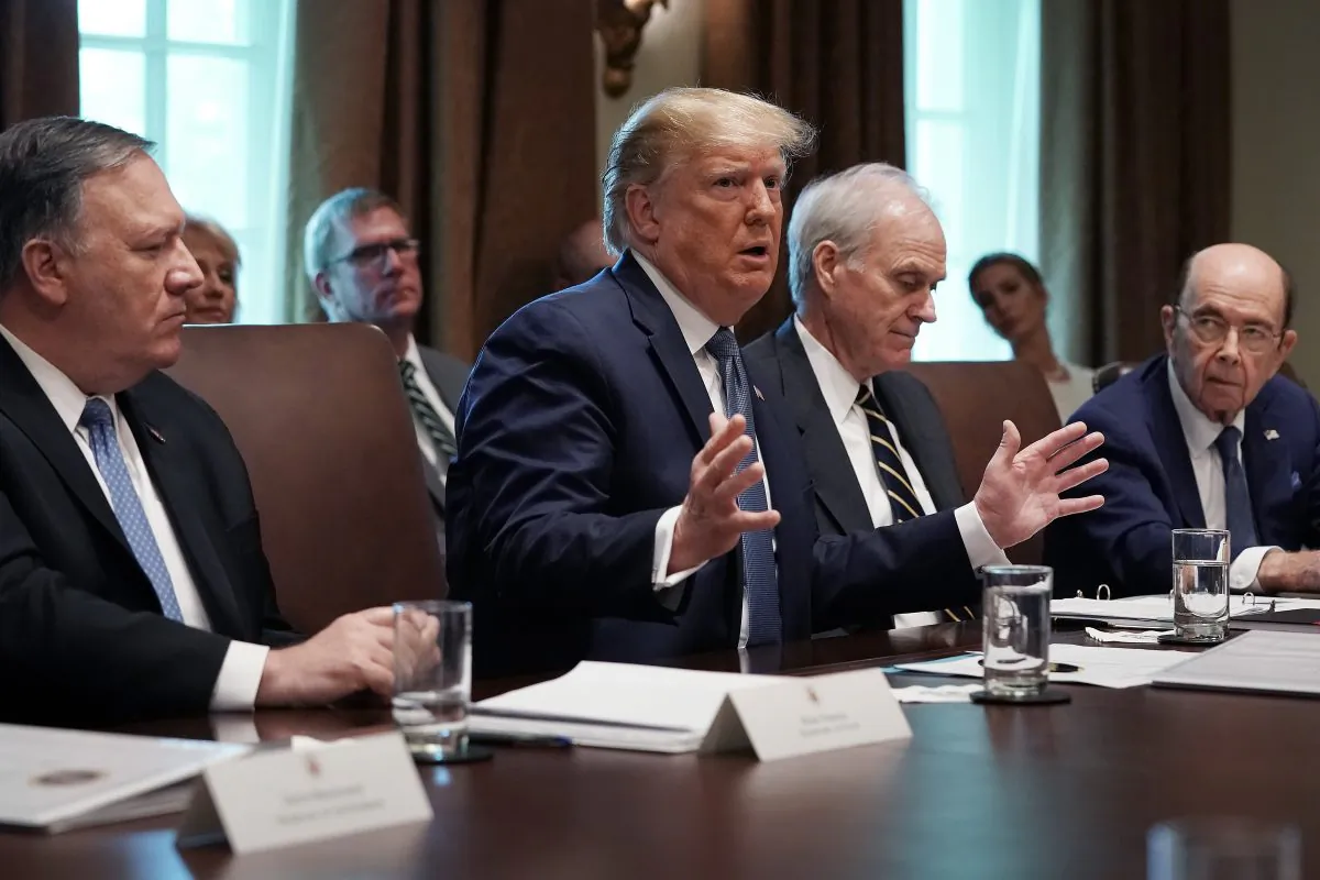 President Donald Trump (C) talks with journalists during a cabinet meeting with (L-R) Secretary of State Mike Pompeo, acting Defense Secretary Richard Spencer, Commerce Secretary Wilbur Ross and others at the White House on July 16, 2019. (Chip Somodevilla/Getty Images)