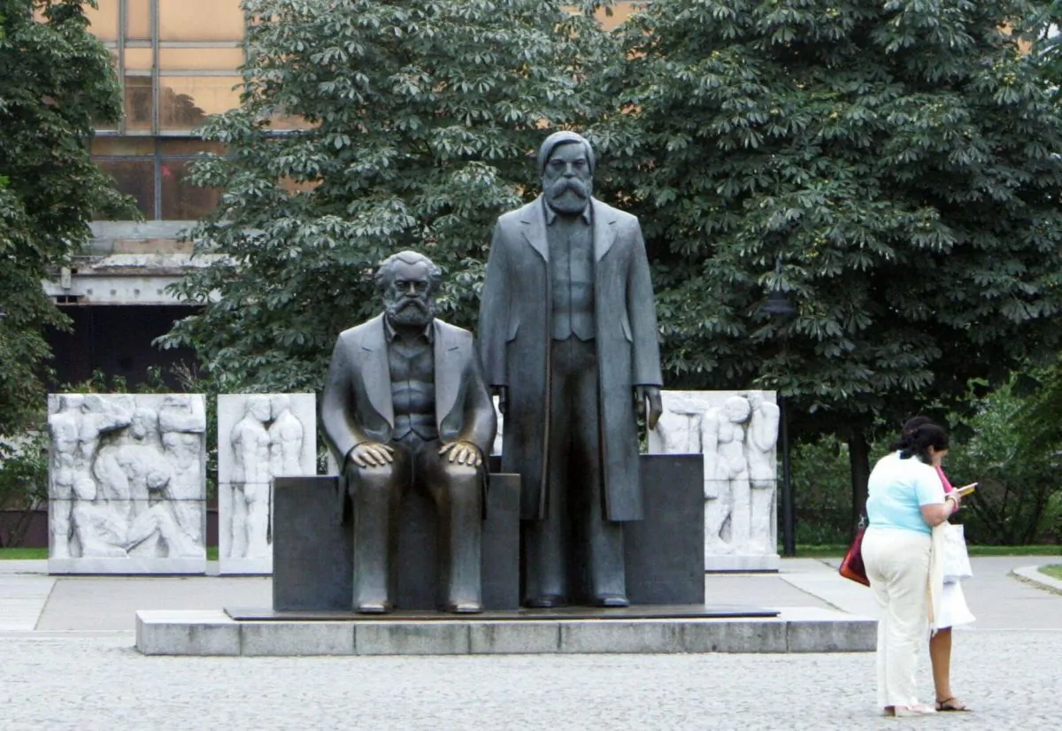 A statue of Karl Marx and Friedrich Engels, the main architects of communism, in front of the Palace of the Republic in Berlin, Germany. (John MacDougall/AFP/Getty Images)