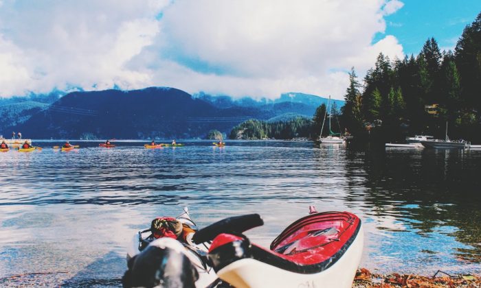 Stock photo of kayaks on a body of water. (Josh Trommel/Unsplash)