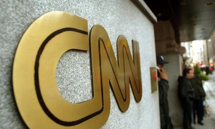The CNN sign is seen outside its headquarters in New York City, N.Y., on Nov. 12, 2002. (Mario Tama/Getty Images)
